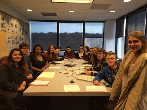 Journalism class visits The Record; sits in on news meeting with Editor Martin Gottlieb