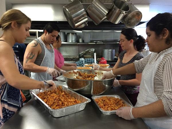 GHG members prepare meals for the less fortunate