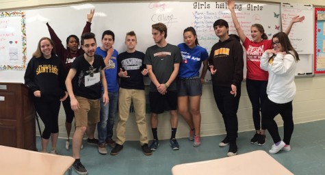 Members of the 2014-2015 Cat's Eye View staff wore their college gear to school on May 1.