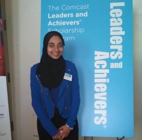 Senior Tasneem Tawfeek receives her award for volunteerism.