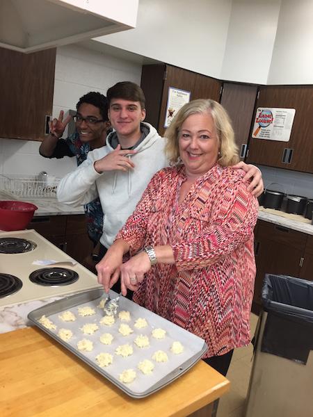 Mrs. Marut and her culinary students enjoy the art of baking.