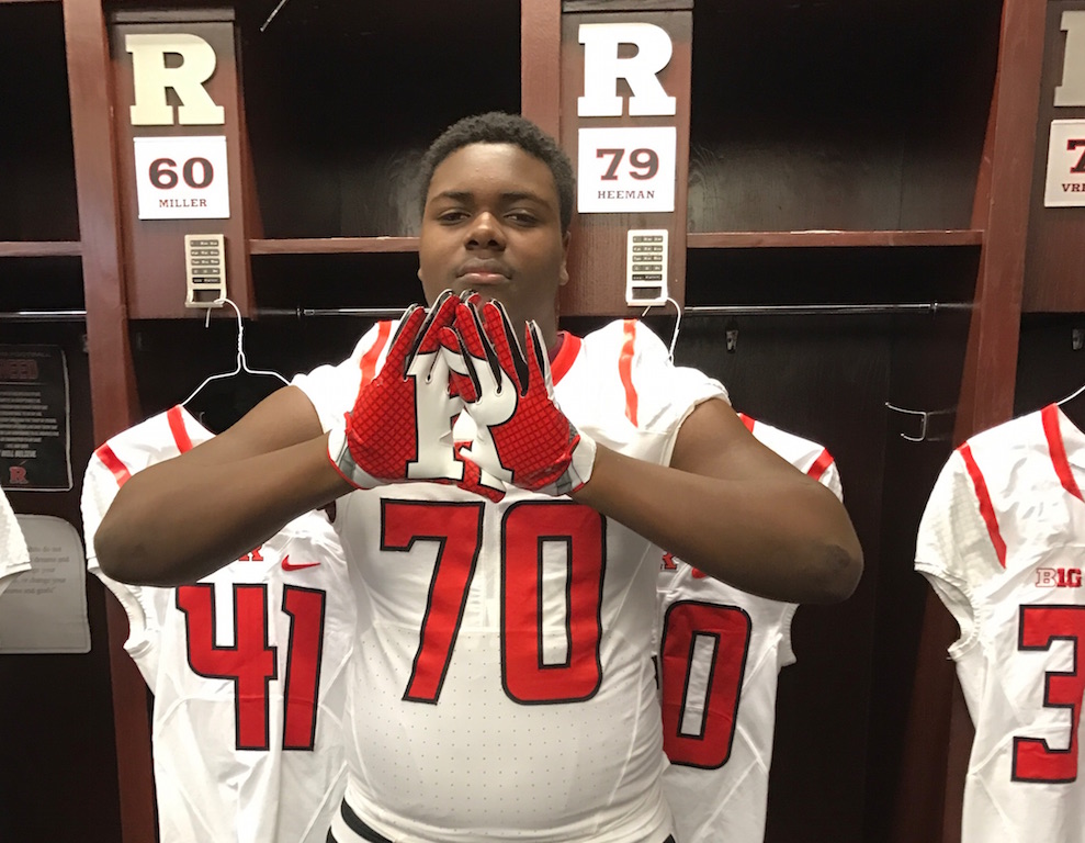Greg sports his Rutgers gear while hanging out in the universitys football locker room.