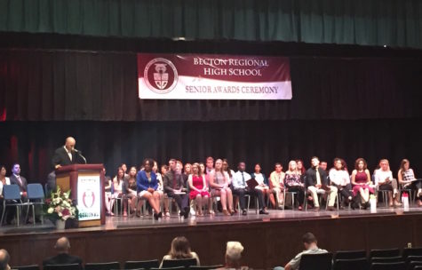 The awards recipients remained on stage after receiving their accolades.