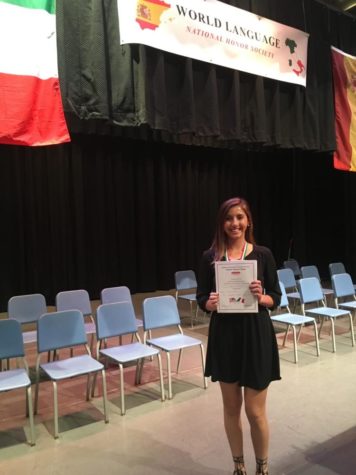 Junior Jana Christiano is inducted into the Italian Honor Society.