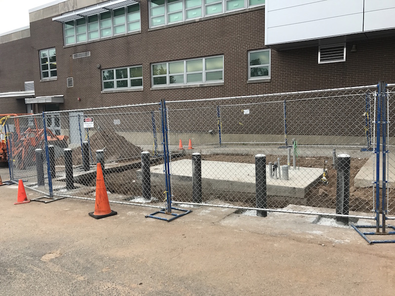 The generator will be installed in the back of the high school.