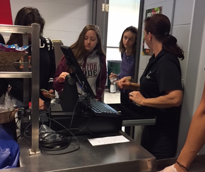 Sophomore Maya Grabowski scans her ID card to pay for her lunch items.