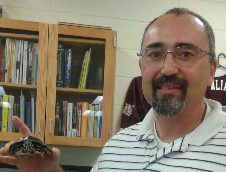 Mr. DAlias biology classes take care of Bectons pet turtle.