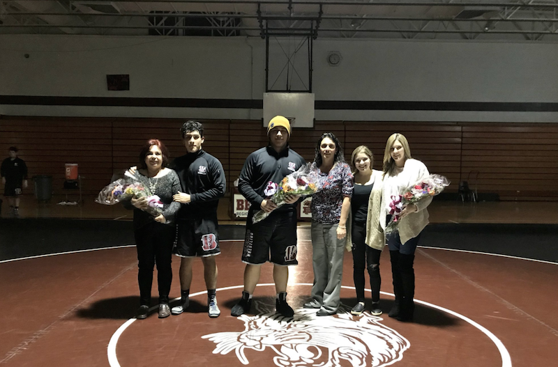 The+senior+wrestlers%2C+Carlos+Mercado+and+Jason+Kopich%2C+along+with+Alexa+Felten%2C+the+teams+statistician+for+all+4+years%2C+are+all+recognized+on+Senior+Night.+