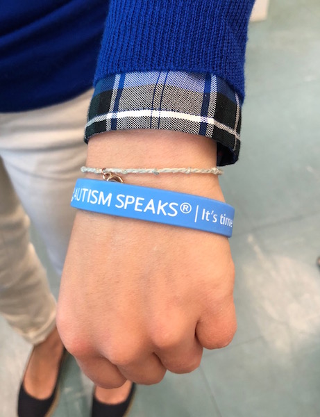 Blue bracelets, which symbolize autism awareness, were sold throughout the high school.