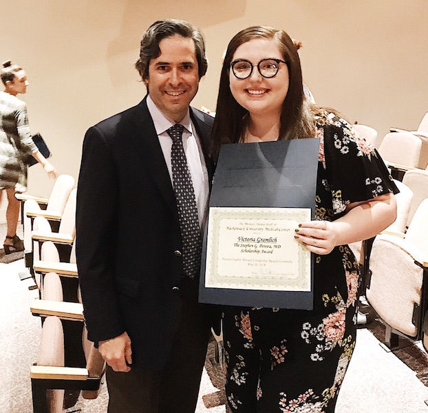 Becton Regional High School's Victoria Gramlich receives a scholarship award from Stephen G. Pereira, M.D. 