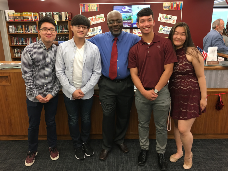 Becton students Austin Kim, Gene Lee, Timothy Reid and GaHyun Yoo all worked alongside District Technology Coordinator Mr. Gbaguidi during this school year.
