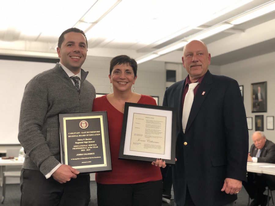 Acting Superintendent/Principal Dr. Sforza and Board President Mr. Monks present Ms. Jonna Calvanico with the Educational Services Professional Award for 2018-2019.