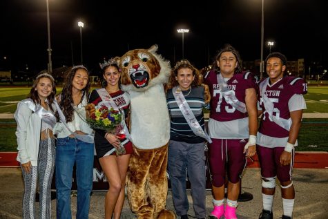 Cheerleader Crowned Homecoming Queen in Patriot Victory, School