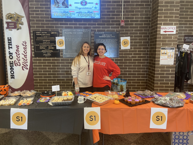  Maher and Skehan conducting their Wellness Bake sale, one of their many community-based events.