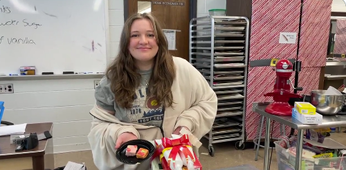 Megan Kruse, First Place winner of Key Club baking competition, with her Gluten free petit fours. 