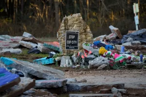 A makeshift memorial has been erected for environmental activist Manuel Paez Terán, who was killed Jan. 18 during an encounter with law enforcement at the site of the planned police training center called Cop City in South River Forest. (Cheney Orr/AFP via Getty Images)
