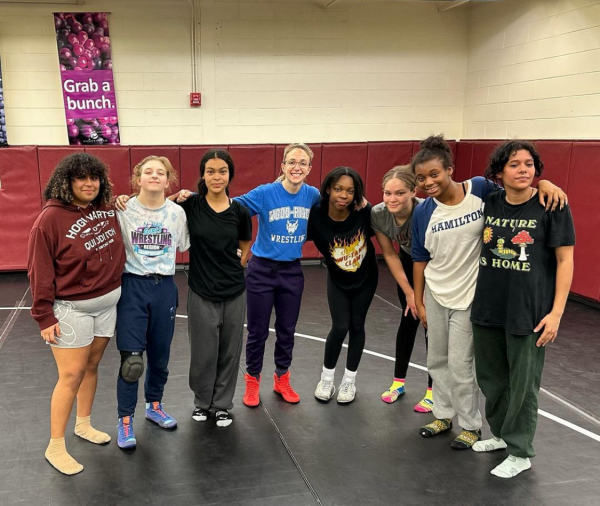 The Lady Wildcat Wrestling Team and Coach Fiona Rupinski after practice. 