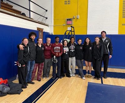 Half a Century of Grit: Wrestling Program Honors Its 100-Win Legends